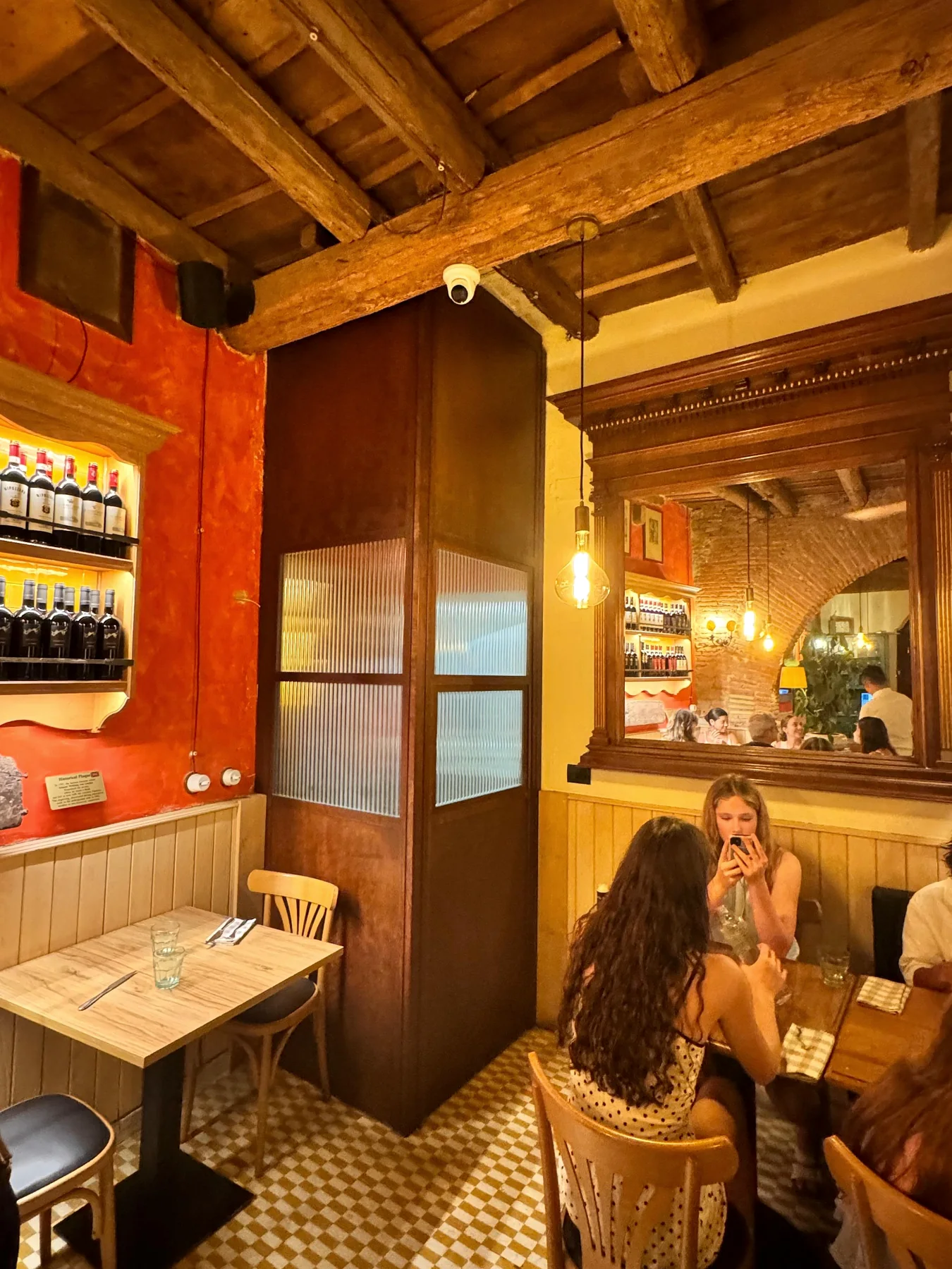 Intimate dining corner with exposed beams